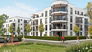 A modern multi-story residential building with balconies, a landscaped garden, and a pedestrian pathway.