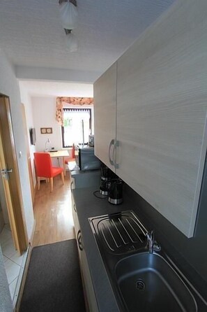 Fridge, microwave, coffee/tea maker, toaster