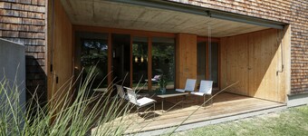 Modern appartement met tuin