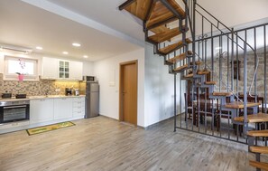 Fridge, stovetop, dishwasher, coffee/tea maker