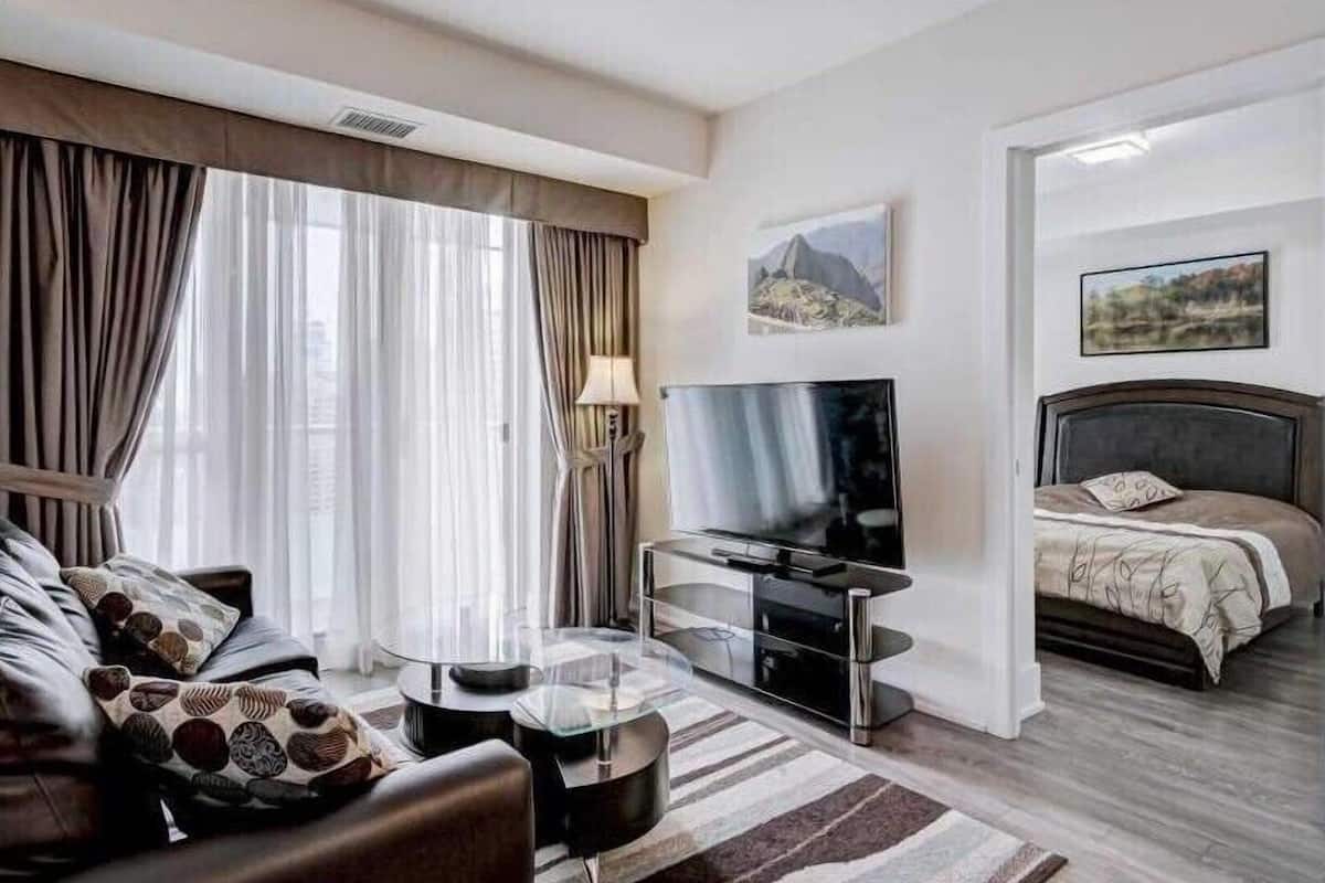 Deluxe Apartment | Living area | 52-inch Smart TV with cable channels, TV