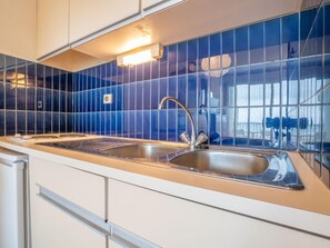 Fridge, microwave, toaster, cookware/dishes/utensils