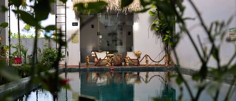 Outdoor pool, open 6:00 AM to 10:00 AM, sun loungers