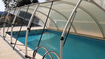 Piscine extérieure, piscine chauffée