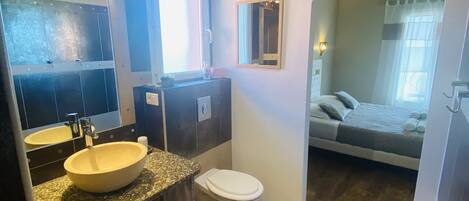 Bathtub, hair dryer, towels, soap