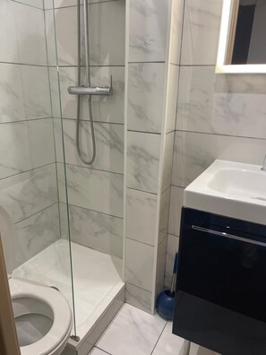 Hair dryer, towels, soap, shampoo