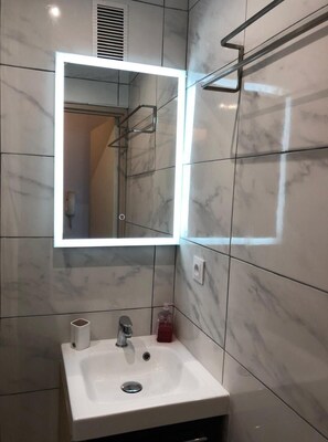 Hair dryer, towels, soap, shampoo