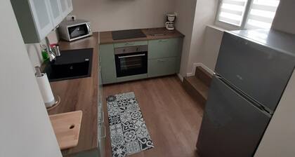 " Les Hauts De Bourg " APT 101 T2 COSY de 45 m2, 1 ch avec écran plat