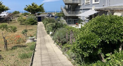 Beautiful apartment terrace facing the sea sandy beach