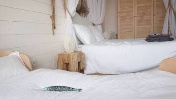 1 slaapkamer, een strijkplank/strijkijzer, wifi, beddengoed