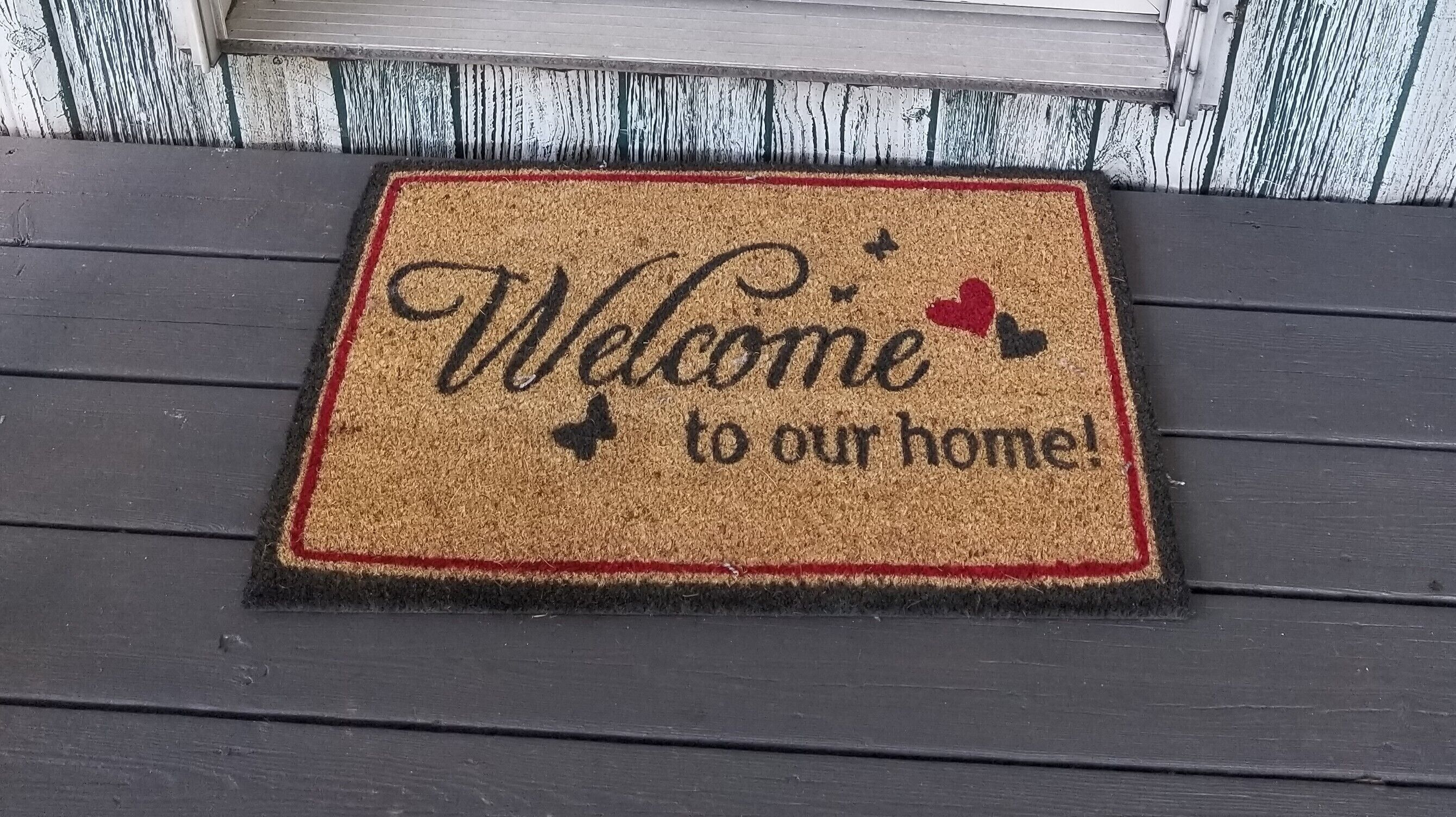 A welcome mat with the text "Welcome to our home!"
