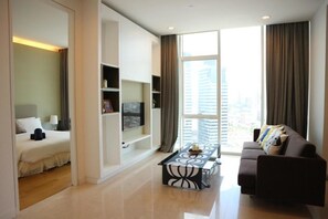 Suite Bisnis, 1 kamar tidur (A) | Ruang keluarga | TV layar datar