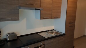 Fridge, microwave, toaster, cookware/dishes/utensils