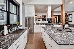 Toaster, spices, dining tables, kitchen islands