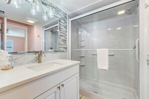 Shower, hair dryer, towels