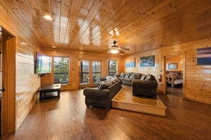 Flat-screen TV, fireplace, video games, DVD player