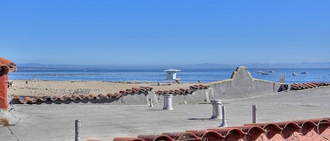 On the beach, sun-loungers