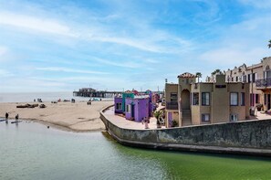 On the beach, sun-loungers