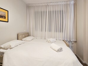 2 habitaciones, tabla de planchar con plancha y wifi gratis 