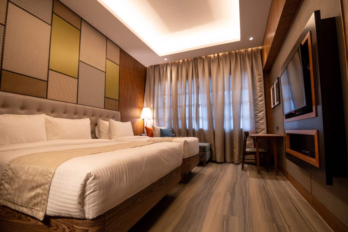 Deluxe Quadruple Room, Multiple Beds | Egyptian cotton sheets, premium bedding, individually decorated