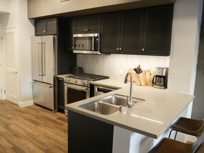 Fridge, microwave, oven, stovetop - Gaslamp Condo Downtown, Free Parking, Pets stay free (San Diego)