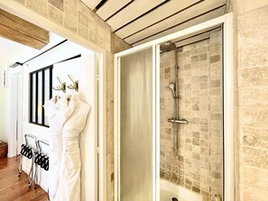 Shower, hair dryer, towels, soap