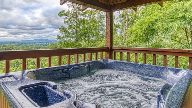 A hot tub under a wooden gazebo with a view of a forest and mountains. - View-topia! VIEWS, VIEWS AND MORE VIEWS (Sevierville)