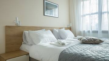 Departamento Deluxe (41) | Tabla de planchar con plancha, wifi gratis y ropa de cama