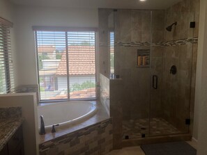 Combined shower/tub, hair dryer, towels, soap