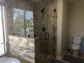 Combined shower/tub, hair dryer, towels, soap