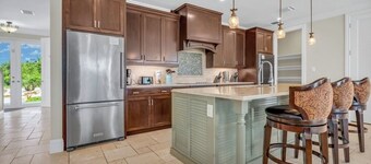 W09 - New Luxury Property! Breathtaking Canal Front Pool Home - Sleeps 14