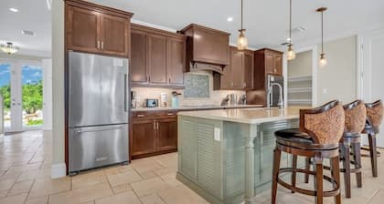 W09 - New Luxury Property! Breathtaking Canal Front Pool Home - Sleeps 14