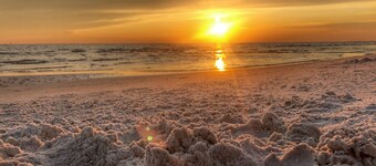 Enjoy sunrise and sunsets on the huge deck and covered bar!