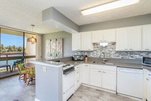 Fridge, microwave, oven, stovetop - Spacious Oceanfront Poipu Condo – Kuhio Shores 202 (Po'ipu)