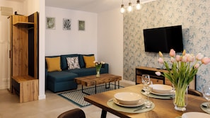 Apartamento (4/1) | Área de estar | TV de tela plana