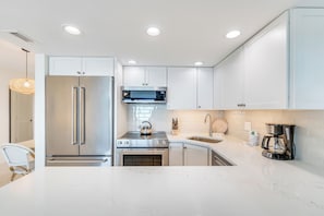 Fridge, microwave, oven, stovetop - OCEAN'S REACH 2X4: 1-Bdrm, Top Floor/Gulf Front Unit! All Amenities Open! (Sanibel Island)