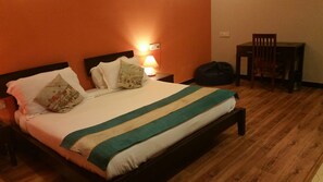 Habitación Deluxe | Cortinas blackout, insonorización y tabla de planchar con plancha