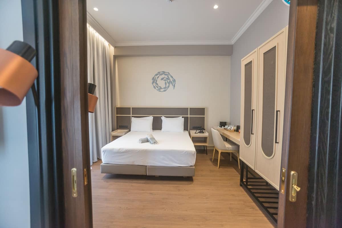 family suite | 1 bedroom, premium bedding, minibar, in-room safe