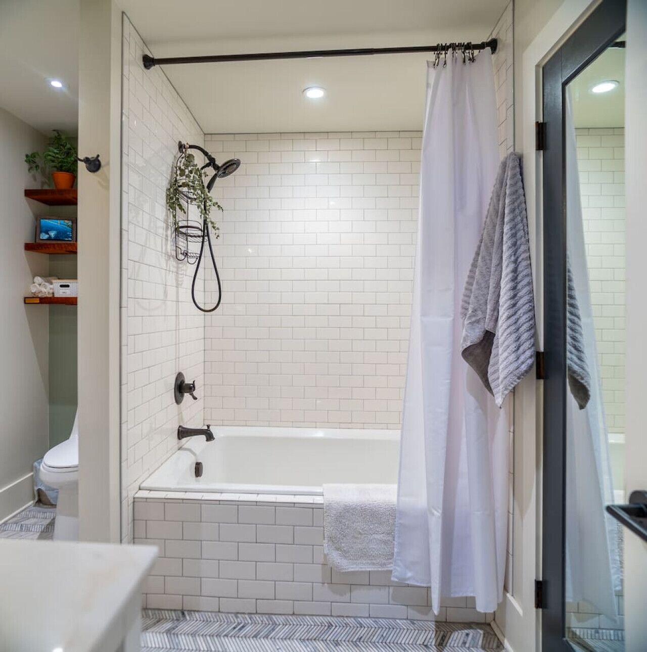 Combined shower/bathtub, hair dryer