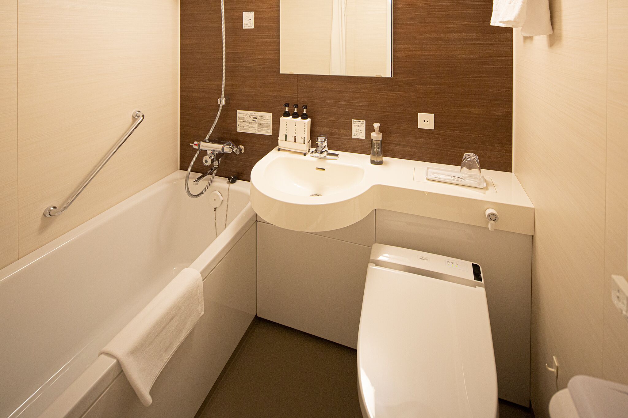 free toiletries, hair dryer, slippers, bidet