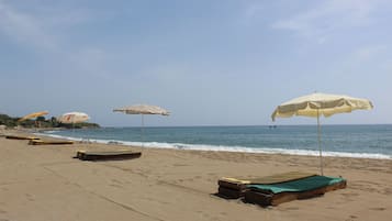 Private beach, white sand, free beach shuttle, free beach cabanas