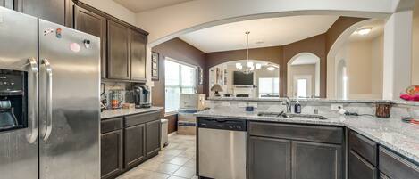 Microwave, dishwasher, coffee/tea maker, cookware/dishes/utensils