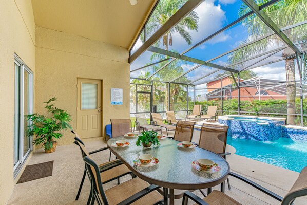 Outdoor pool, a heated pool - 7 Beds, 7 Bath Acadia Estates Home with Private Pool and Spa Minutes to Disney! (Kissimmee)