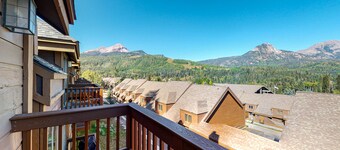 Two-story mountain condo with fireplace & beautiful views