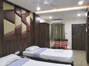 Premium bedding, memory-foam beds, in-room safe, desk