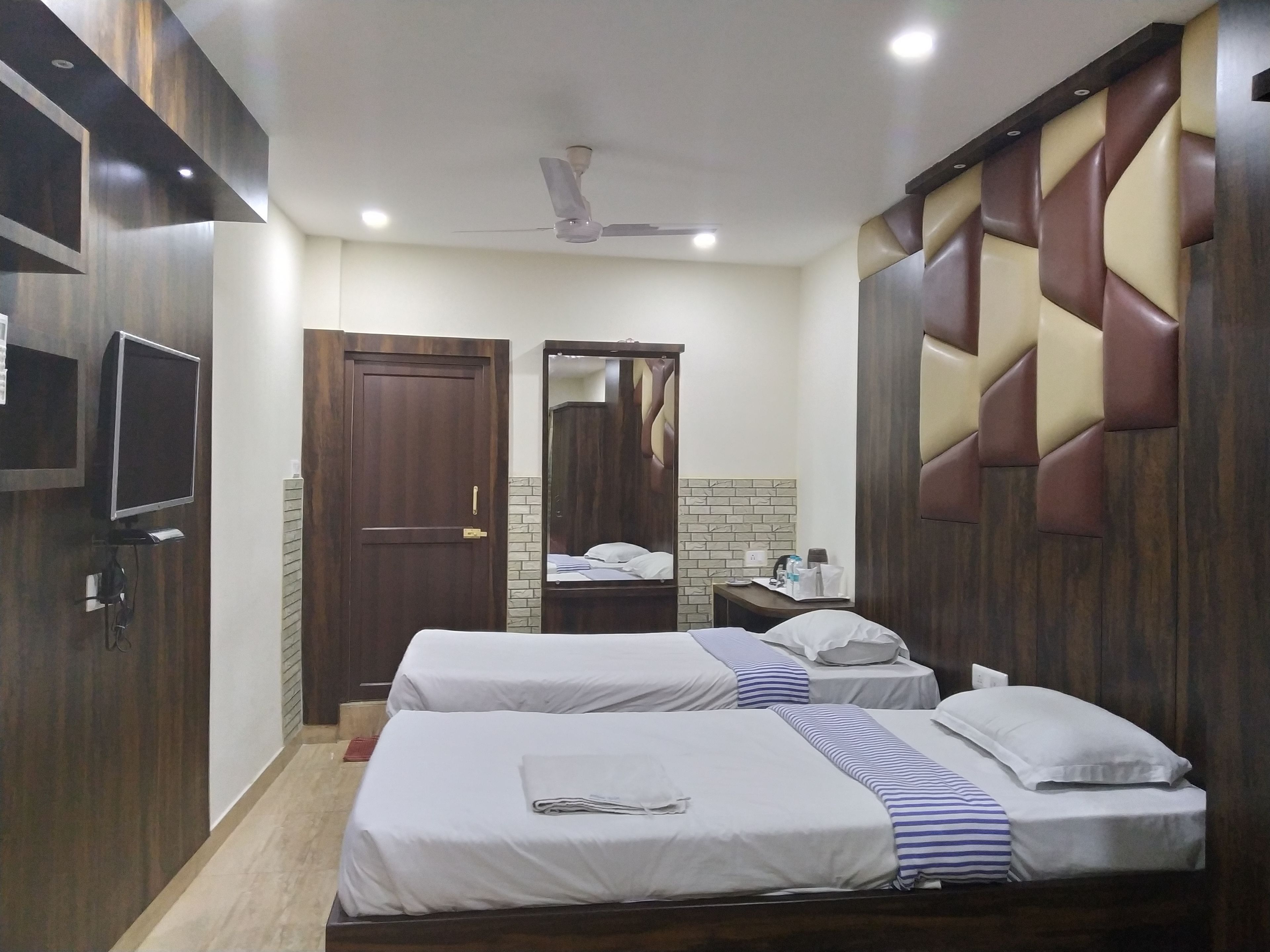 Premium bedding, memory-foam beds, in-room safe, desk