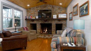 Smart TV, fireplace, books, offices