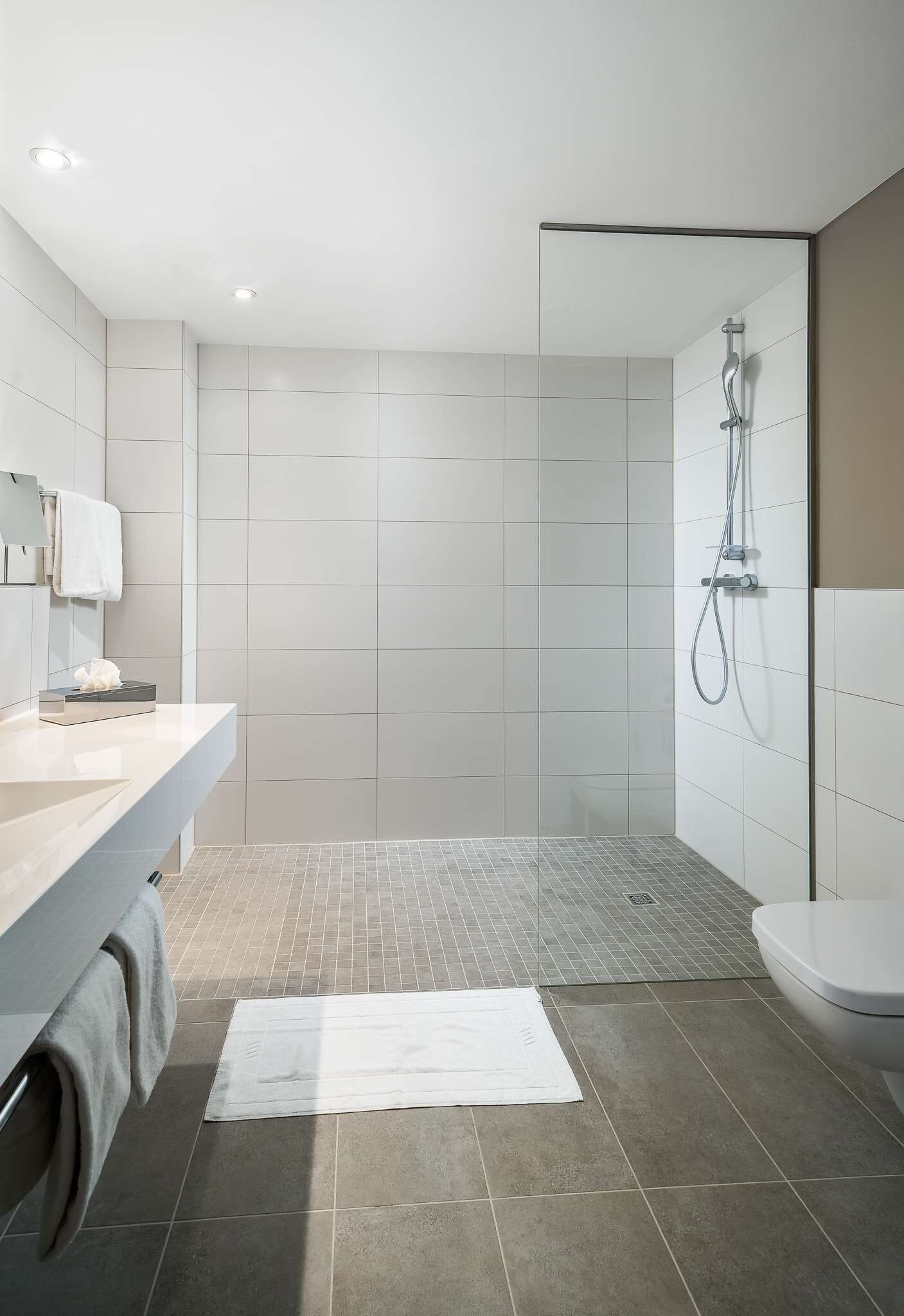 standard apartment | bathroom | shower, eco-friendly toiletries, hair dryer, heated floors