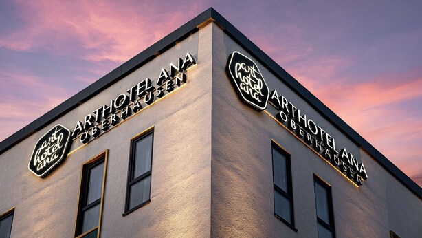 A building with the sign "ARTHOTEL OBERHAUSEN" indicating a hotel. - elaya hotel oberhausen, Trademark by Wyndham (Oberhausen)