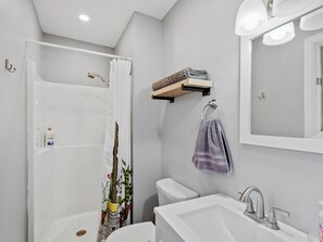 Combined shower/tub, hair dryer, towels, soap